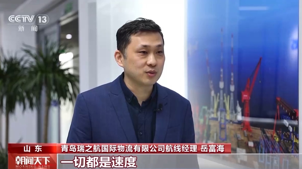 九游体育：一线分钟青岛港科技升级货物“秒通关”(图1)